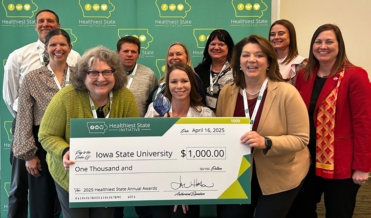 Picture of employees with check 